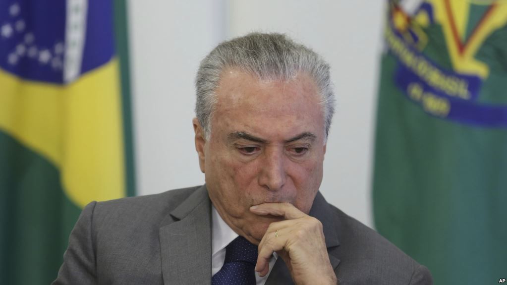 El informe del miércoles generó algunos pedidos para la renuncia de Temer al igual que protestas en Sao Paulo.